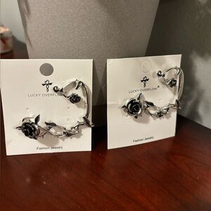 NWT  Set of 2 Black/Silver Rose Earrings wrap around to earlobe 
Never worn